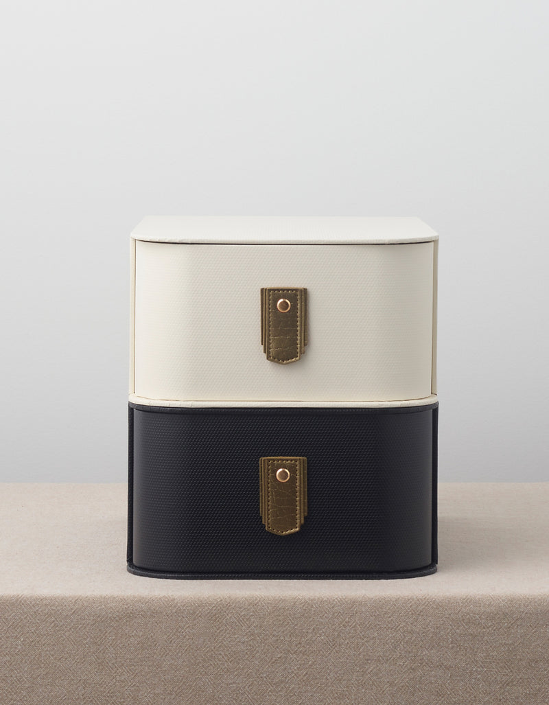 Gold leather pull handle by Sagitine, featuring a sleek and modern design