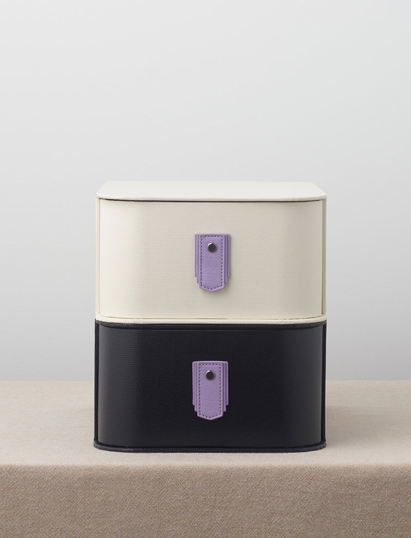 Lavender leather pull handle from Sagitine, featuring a sleek design and elegant color.
