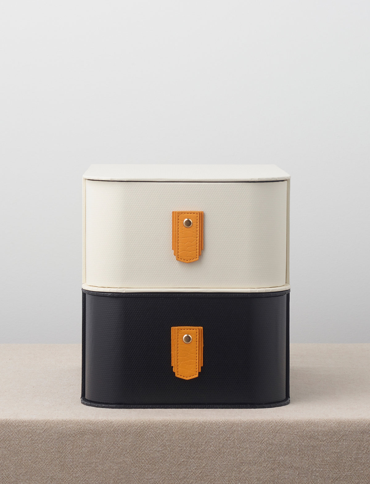 Amber leather pull handle from Sagitine, featuring a sleek design and sustainable material.