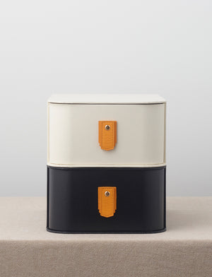 Amber leather pull handle from Sagitine, featuring a sleek design and sustainable material.