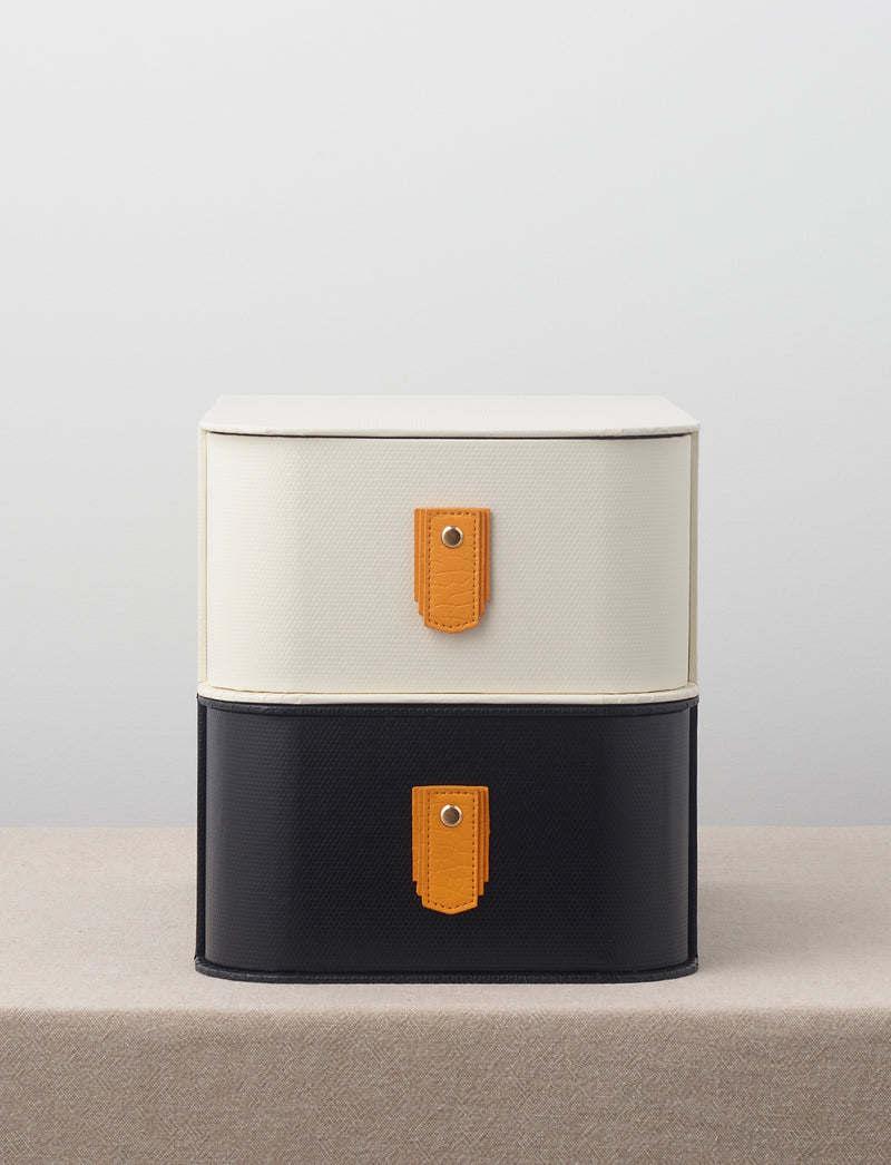 Amber leather pull handle from Sagitine, featuring a sleek design and sustainable material.