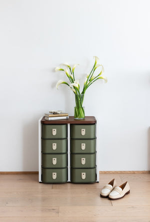 Olive 8 box stand with white legs from SAGITINE, featuring a sleek, modern design.