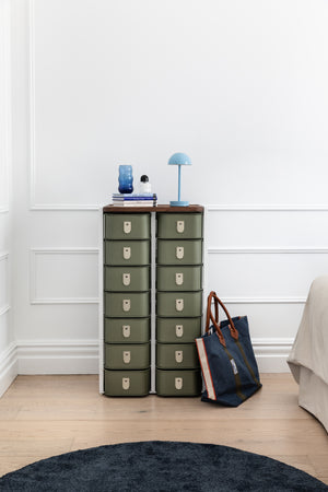 Olive 14 box stand with white legs by SAGITINE, featuring sleek design and sturdy construction.