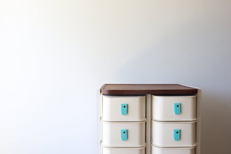 Seafoam leather pull handle by Sagitine, featuring a soft texture and stylish design.