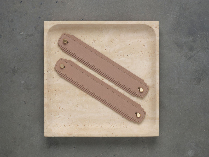Blush leather handle from Sagitine featuring a smooth finish and stylish design