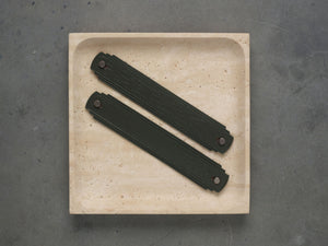 Khaki leather handle by Sagitine, featuring sturdy construction and elegant design.