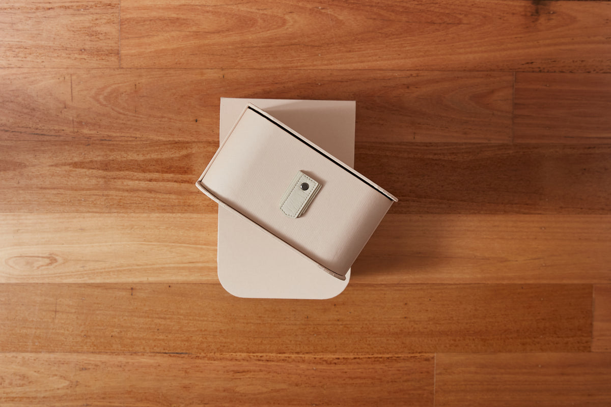 White 14 box stand with nougat boxes and cream handles by Sagitine