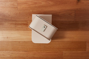 White 14 box stand with nougat boxes and cream handles by Sagitine