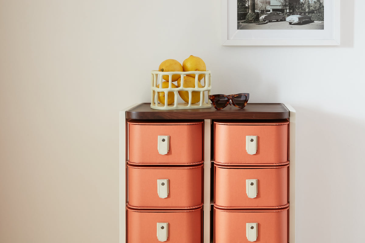 Terracotta 20 Box Stand with cream handles and white structure by Sagitine, designed for limited-edition display.