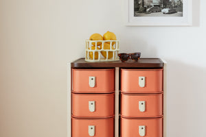 Terracotta 20 Box Stand with cream handles and white structure by Sagitine, designed for limited-edition display.