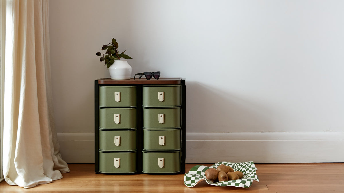 Florence 8 box stand by Sagitine with olive boxes and black frame, featuring cream handles.