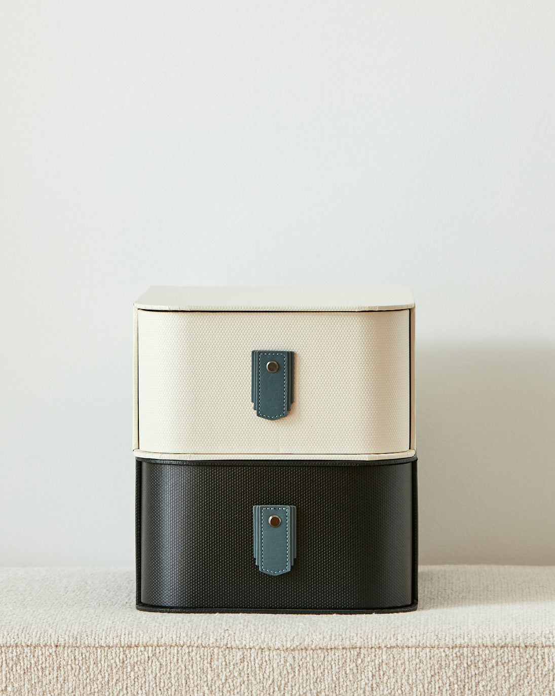 Blue leather pull handle by Sagitine, featuring a sleek design for easy gripping