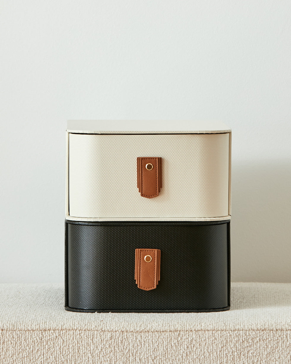 Tan leather pull handle by Sagitine, featuring a sleek design for cabinets or drawers