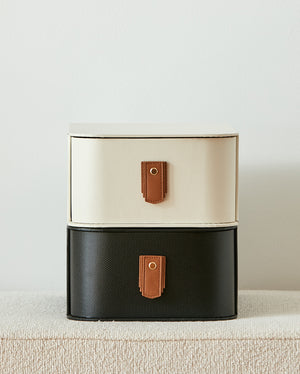 Tan leather pull handle by Sagitine, featuring a sleek design for cabinets or drawers